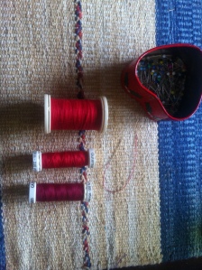 Red thread and pins