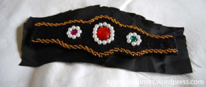 Armband on a piece of lining material